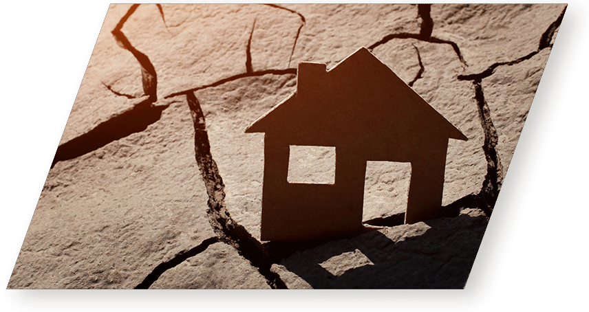 Représentation d'une maison dans une fissure